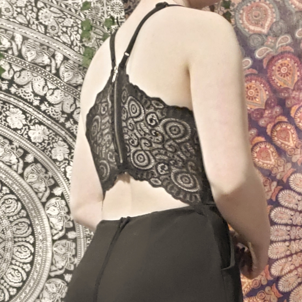 Small black jumpsuit with lace back